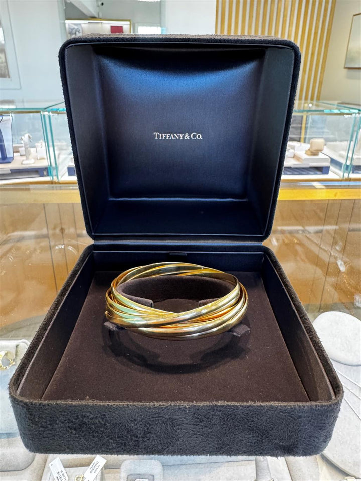 Pre-Owned Tiffany & Co. Paloma Picasso Melody 9-Band Rolling Bangle Bracelet in 18K Yellow Gold