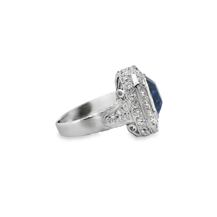 4.50 CT Sapphire and 1.35 CTW Diamond Octagonal Halo Ring in Platinum