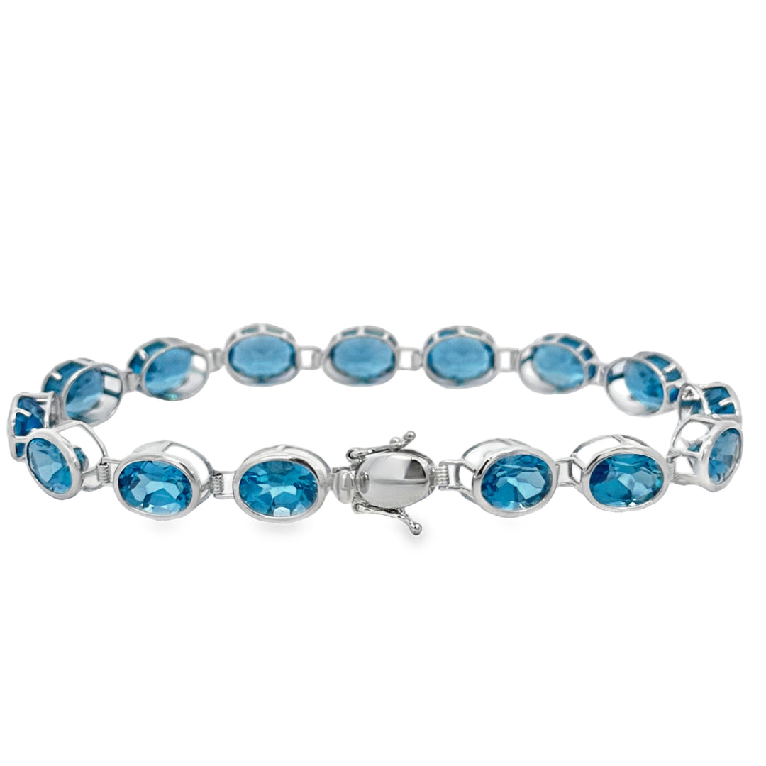 23.49 CTW Blue Topaz Oval 14K White Gold Bracelet