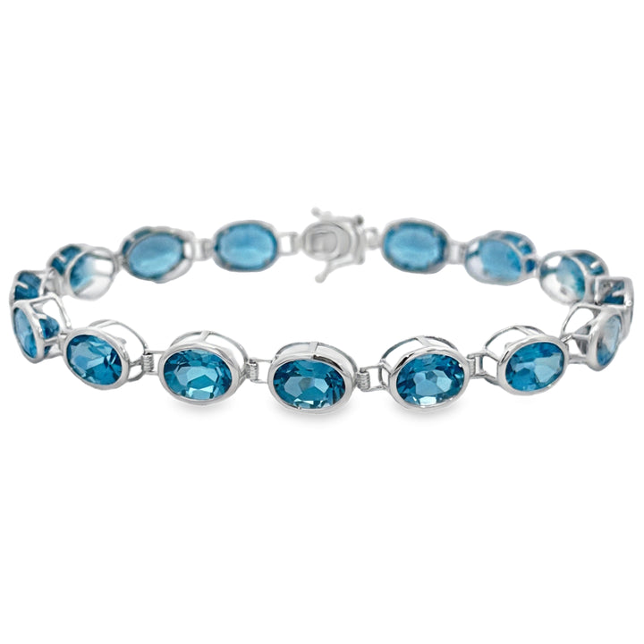 23.49 CTW Blue Topaz Oval 14K White Gold Bracelet