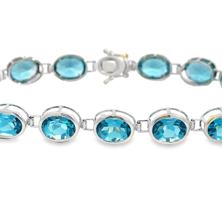 14K White Gold Blue Topaz Oval Link Bracelet