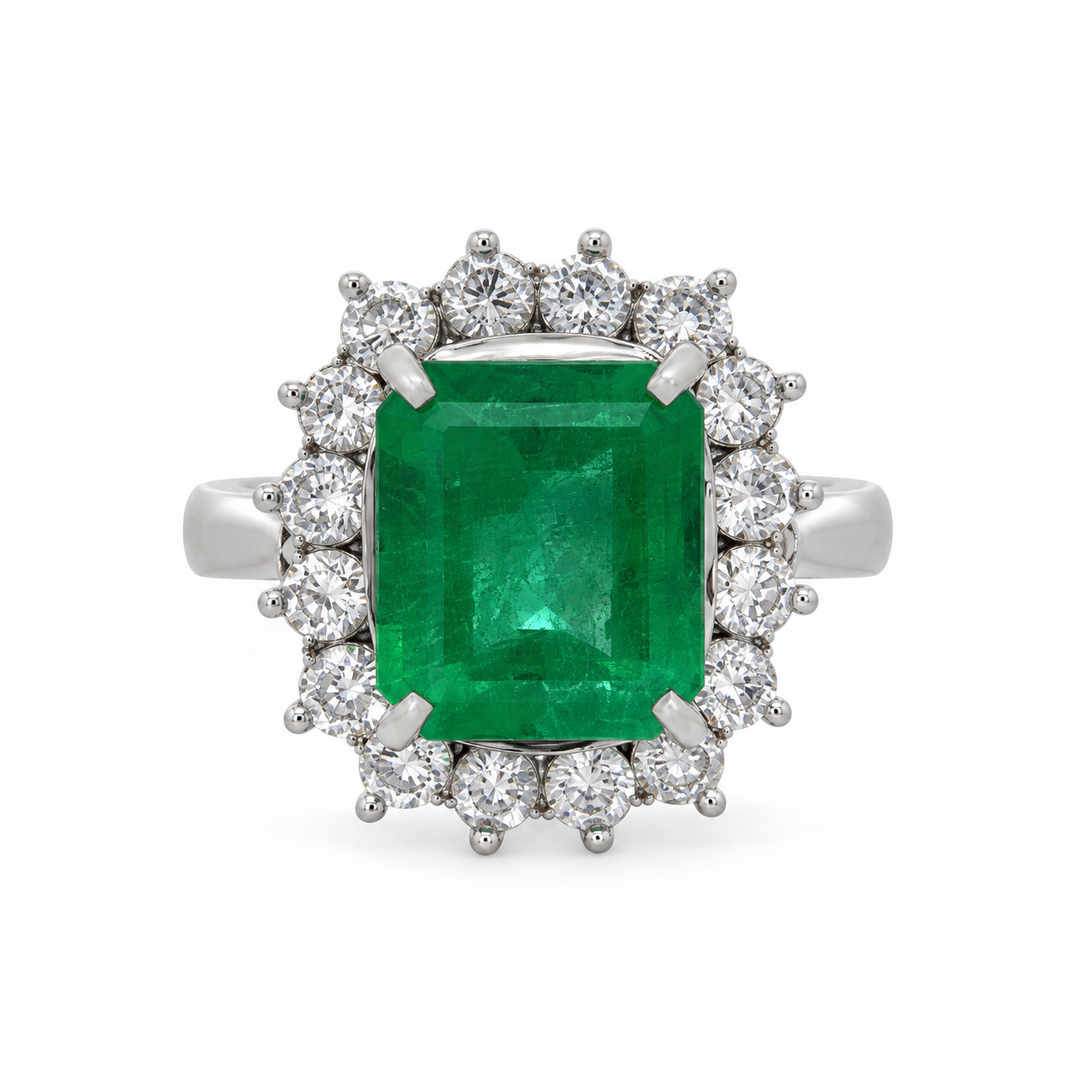 3.13 CT Emerald & 1.01 CTW Diamond Platinum Halo Ring