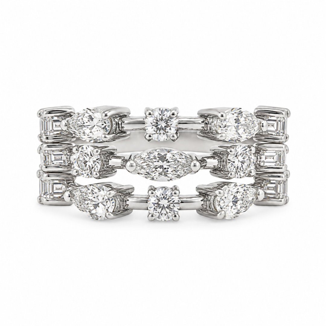 0.95 CTW Pear Diamond, 0.69 CTW Round Diamond, and 0.20 CTW Marquise Diamond 18K White Gold Ring