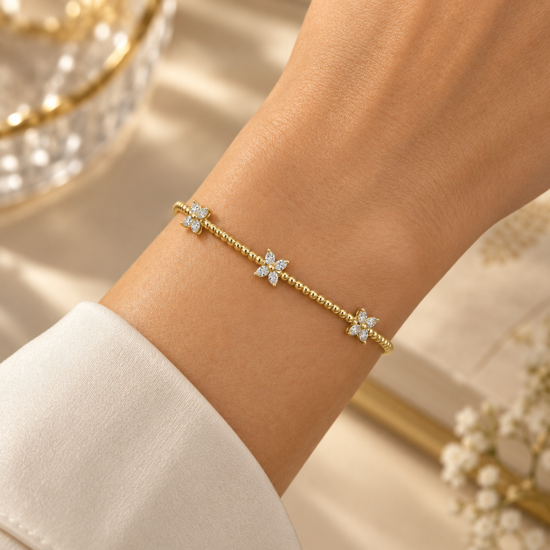0.36 CTW Diamond Flower Flexible Bangle in 14K Yellow Gold
