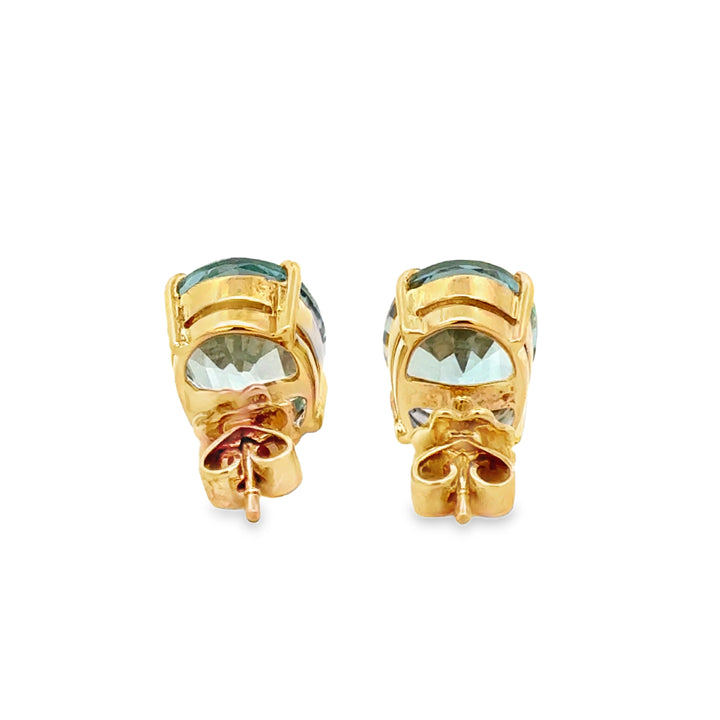 Oval Blue Topaz 14K Yellow Gold Stud Earrings