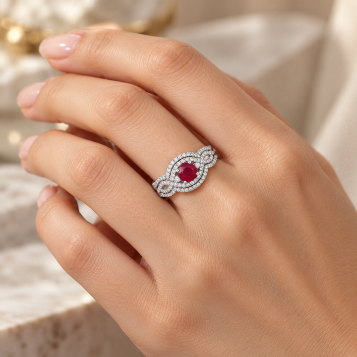 0.85 CT Ruby and 0.50 CTW Diamond White Gold Halo Twist Ring