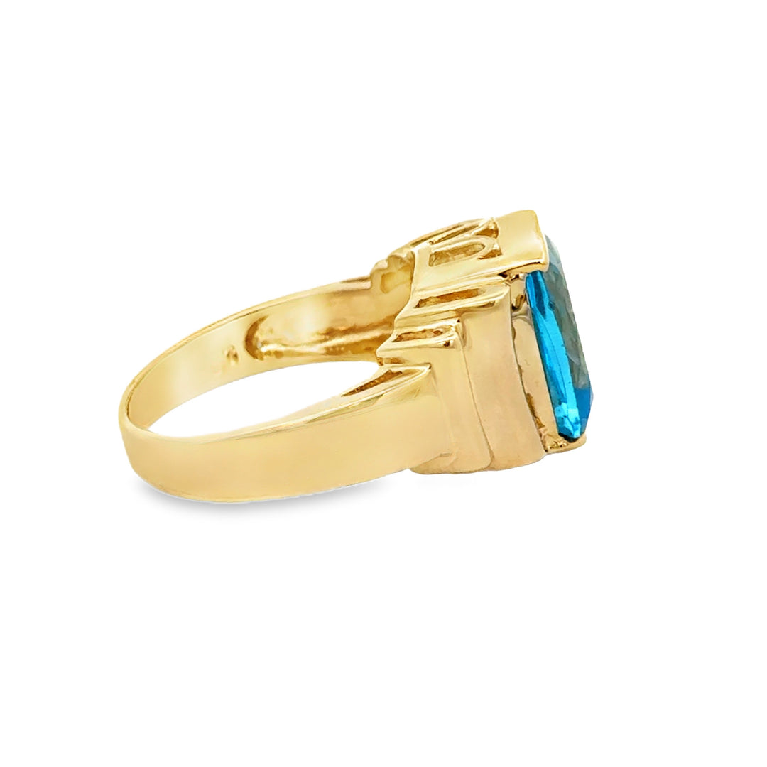 0.15 CTW Diamond and Blue Topaz Ring in 14K Yellow Gold