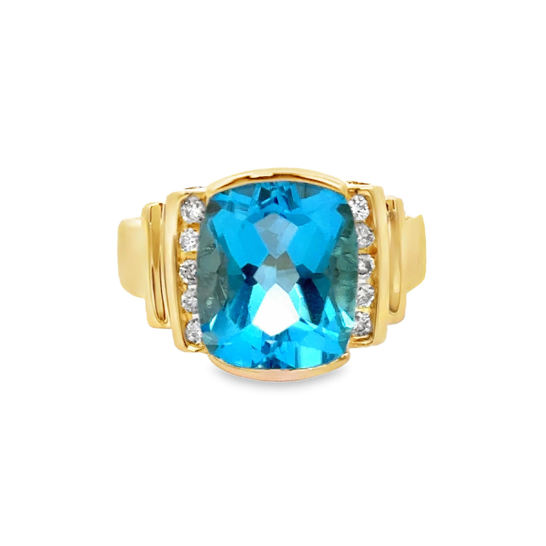 0.15 CTW Diamond and Blue Topaz Ring in 14K Yellow Gold