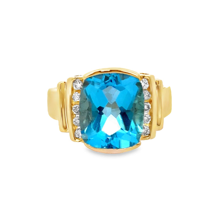 0.15 CTW Diamond and Blue Topaz Ring in 14K Yellow Gold