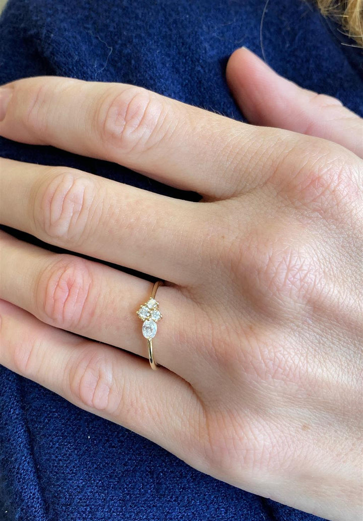 0.27 CTW Oval and Round Diamond 14K Yellow Gold Cluster Ring