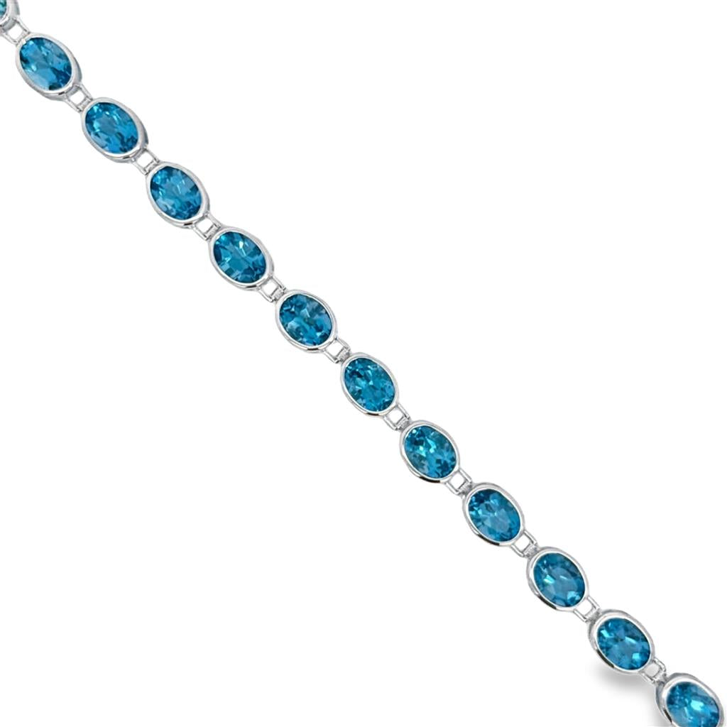 23.49 CTW Blue Topaz Oval 14K White Gold Bracelet