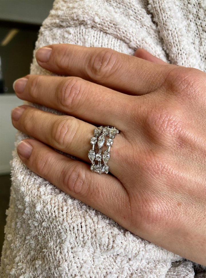 0.95 CTW Pear Diamond, 0.69 CTW Round Diamond, and 0.20 CTW Marquise Diamond 18K White Gold Ring