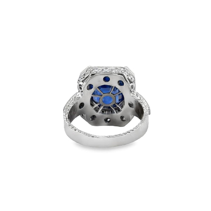 4.50 CT Sapphire and 1.35 CTW Diamond Octagonal Halo Ring in Platinum