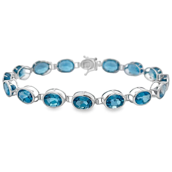 23.49 CTW Blue Topaz Oval 14K White Gold Bracelet
