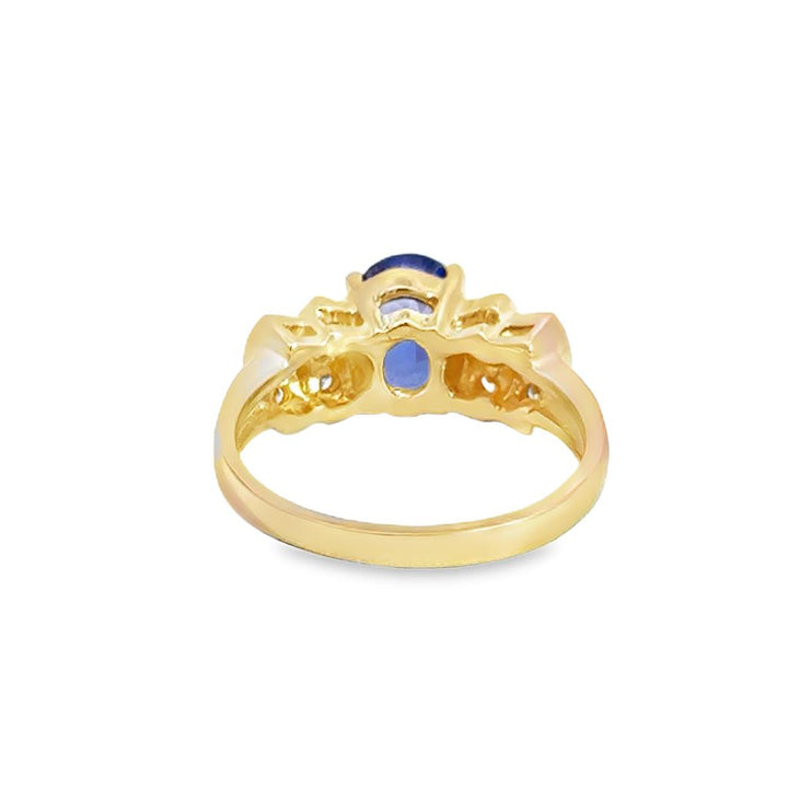 .18ctw Diamond and Oval Tanzanite Ring, 14K Yellow Gold