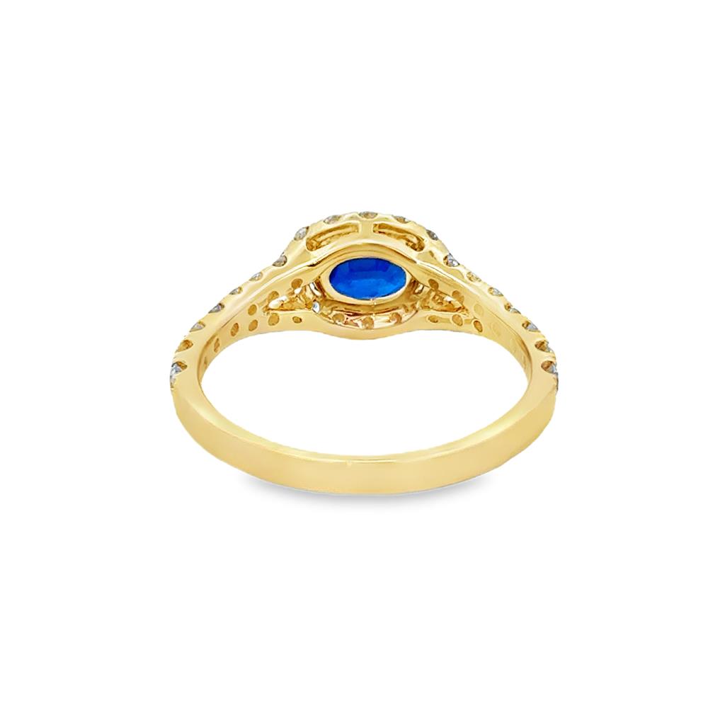 0.94 CT Oval Sapphire & 0.55 CTW Diamond Halo Ring in 14K Yellow Gold