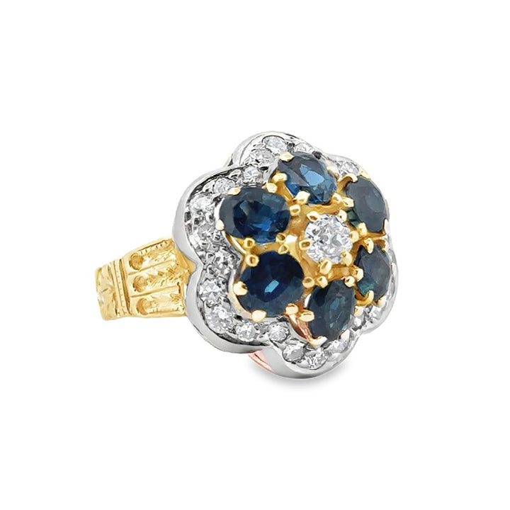 2.00 CTW Oval Sapphire and 0.61 CTW Round Diamond Cluster Ring in 14K Yellow Gold