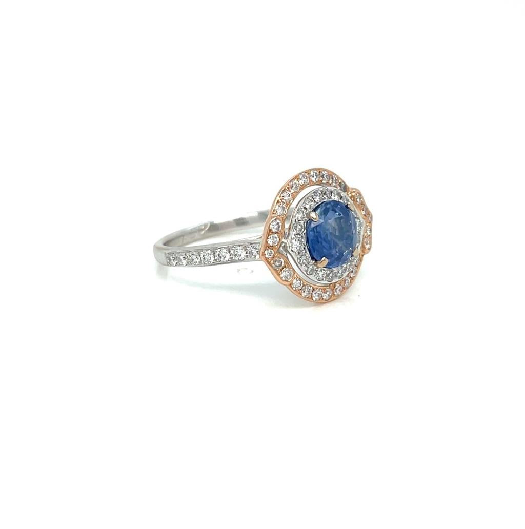 1.48 CT Sapphire and 0.60 CTW Diamond 18K White Gold Halo Ring