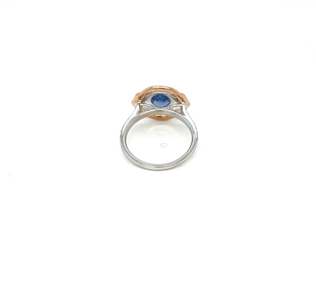 1.48 CT Sapphire and 0.60 CTW Diamond 18K White Gold Halo Ring