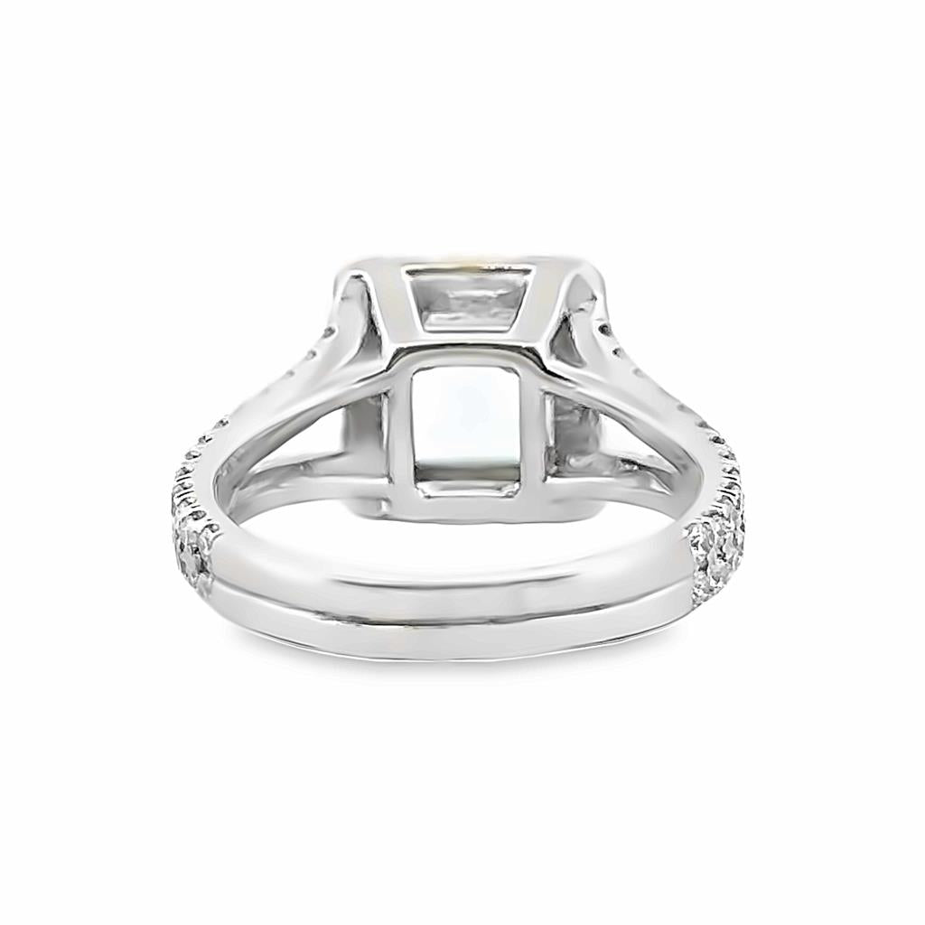 2.02 CT Blue Topaz and 0.75 CT Diamond Halo Split Shank Ring