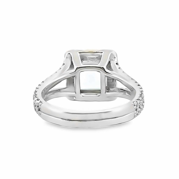 2.02 CT Blue Topaz and 0.75 CT Diamond Halo Split Shank Ring