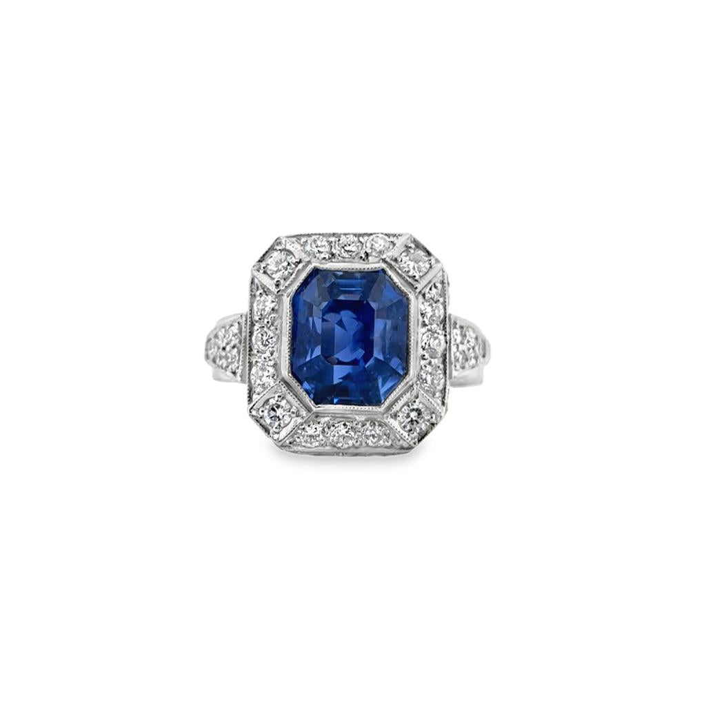 4.50 CT Sapphire and 1.35 CTW Diamond Octagonal Halo Ring in Platinum