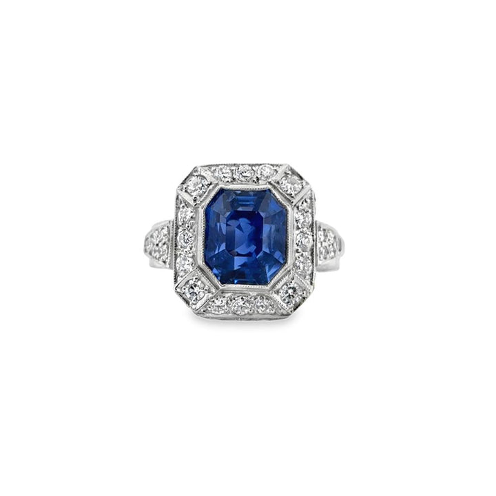 4.50 CT Sapphire and 1.35 CTW Diamond Octagonal Halo Ring in Platinum
