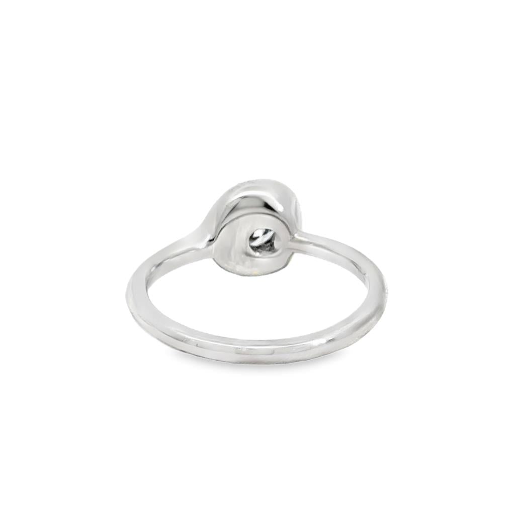 0.61 CT Diamond Platinum Bezel Set Off-Center Ring