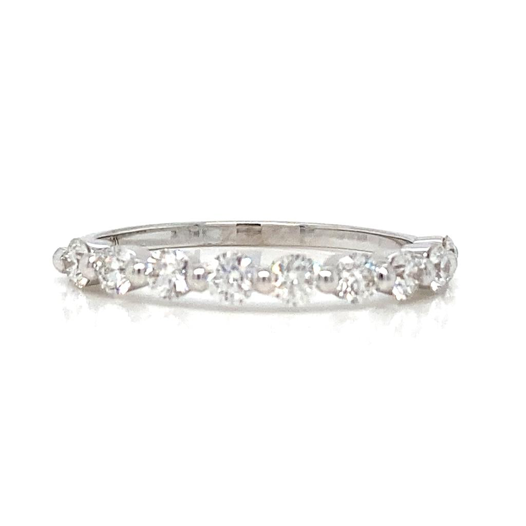 0.56 CTW Round Diamonds 18K White Gold Shared Prong Wedding Band