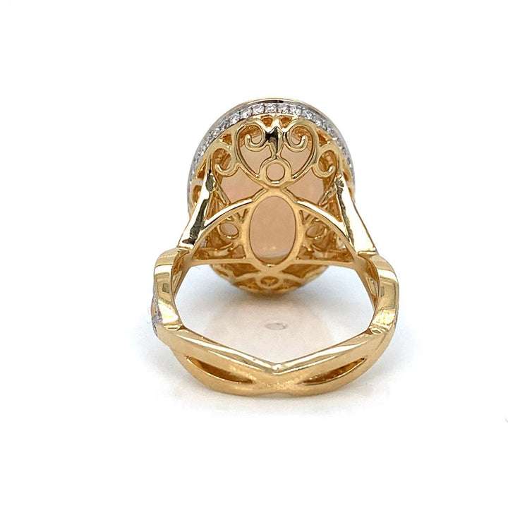 Stunning Opal Ring with Diamond Halo