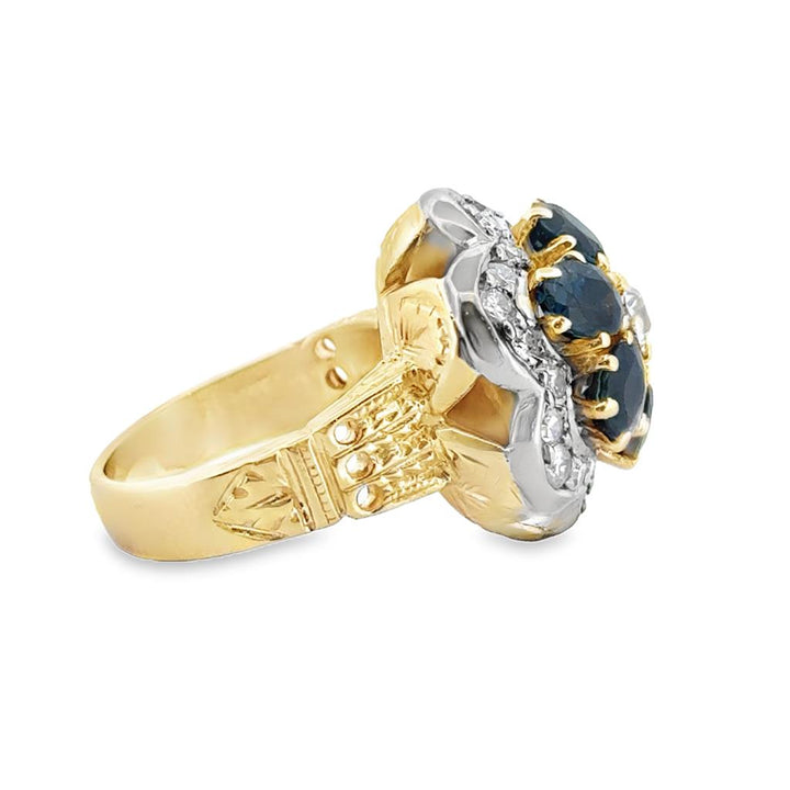 2.00 CTW Oval Sapphire and 0.61 CTW Round Diamond Cluster Ring in 14K Yellow Gold