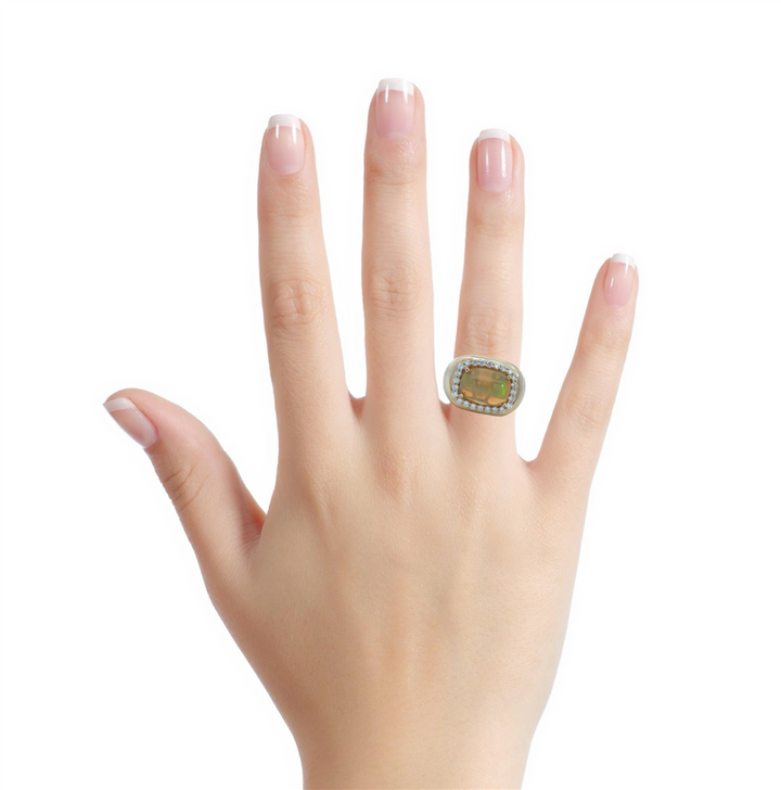 3.70 CT Opal & 0.55 CTW Diamond Halo Ring in 14K Yellow Gold