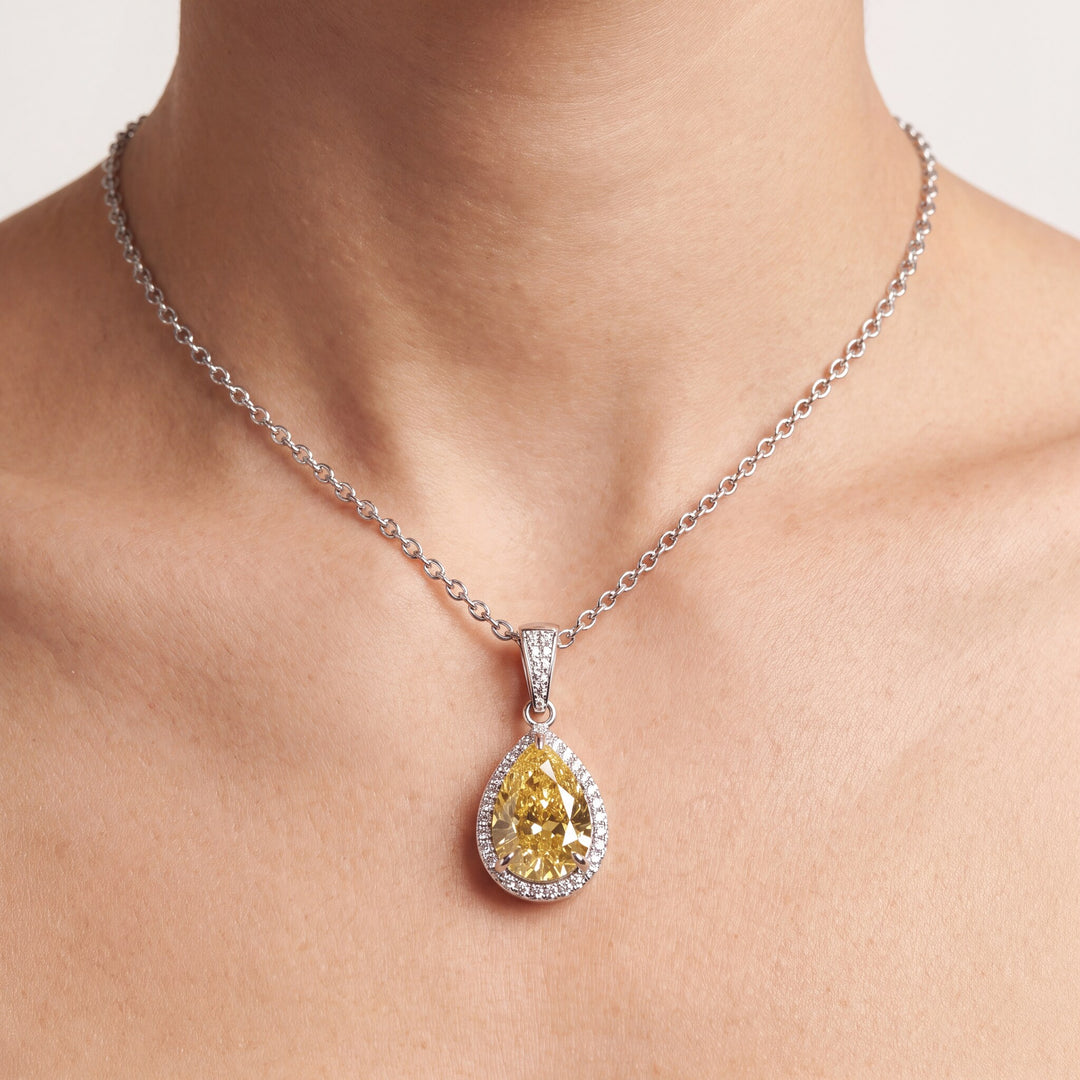 4.24 CT Fancy Yellow Diamond 18K White Gold Pendant Necklace shown on model